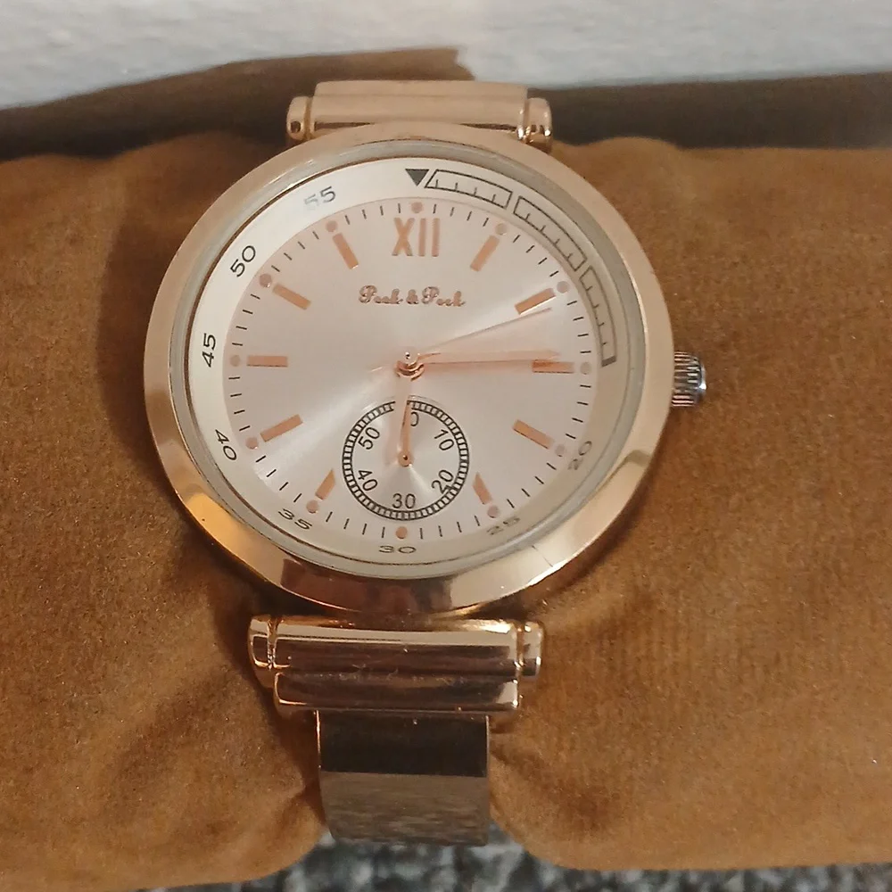 Peck & Peck rose gold tone with white face women's open cuff watch